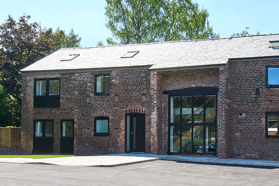 converted barn, thresher barn, 4 bedroom home, cheshire, red brick and 2 storey glass