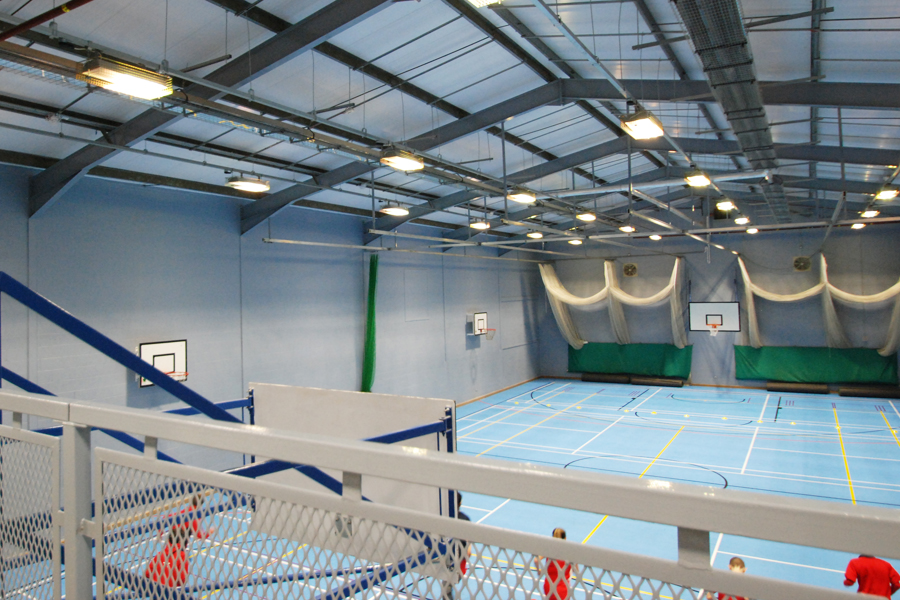 school sports hall showing basket ball nets